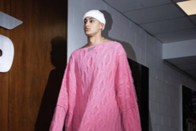 <p>Kyle Kuzma of the Washington Wizards wears an over-size pink jumper on Monday 23 November, 2021, ahead of the Wizards’ game against the Charlotte Hornets.</p>