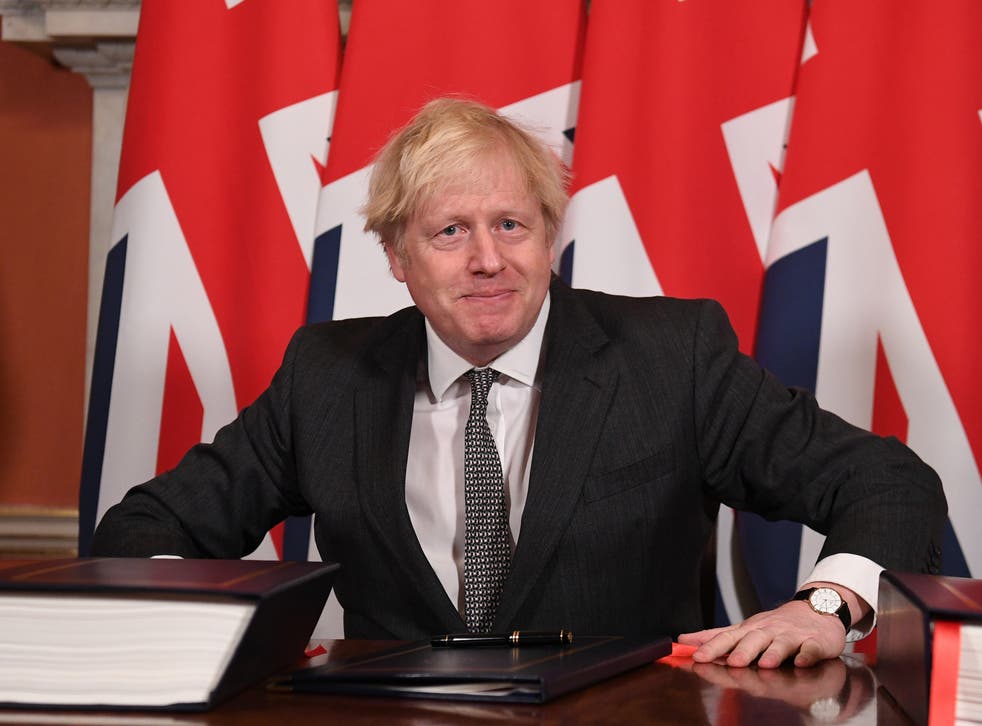 <p>Boris Johnson signs the Brexit deal with the EU </p>