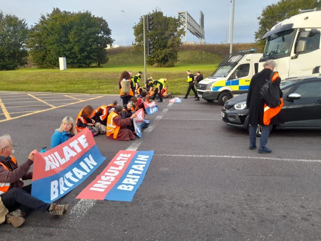 <p>Protesters from Insulate Britain blocking the M25 at junction 31, near to the Dartford Crossing in Thurrock, Essex</p>