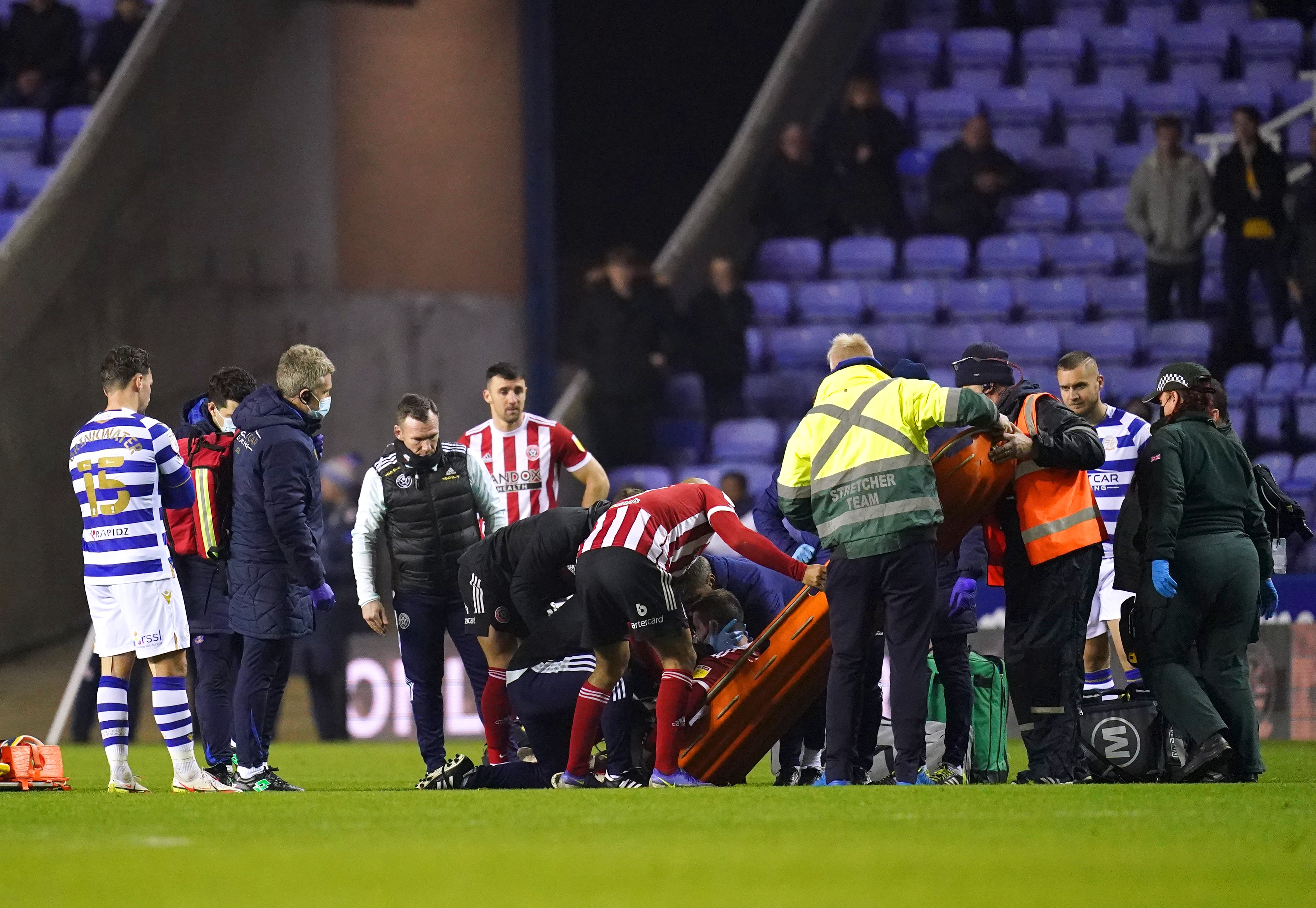 Sheffield United’s John Fleck was taken from the pitch on a stretcher (John Walton/PA)