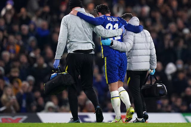 Ben Chilwell, centre, is helped off the pitch with an injury (Adam Davy/PA)