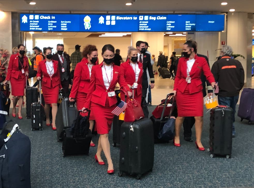 <p>Touch down: The crew of the first Virgin Atlantic flight to Orlando in Florida since the coronavirus pandemic began. </p>