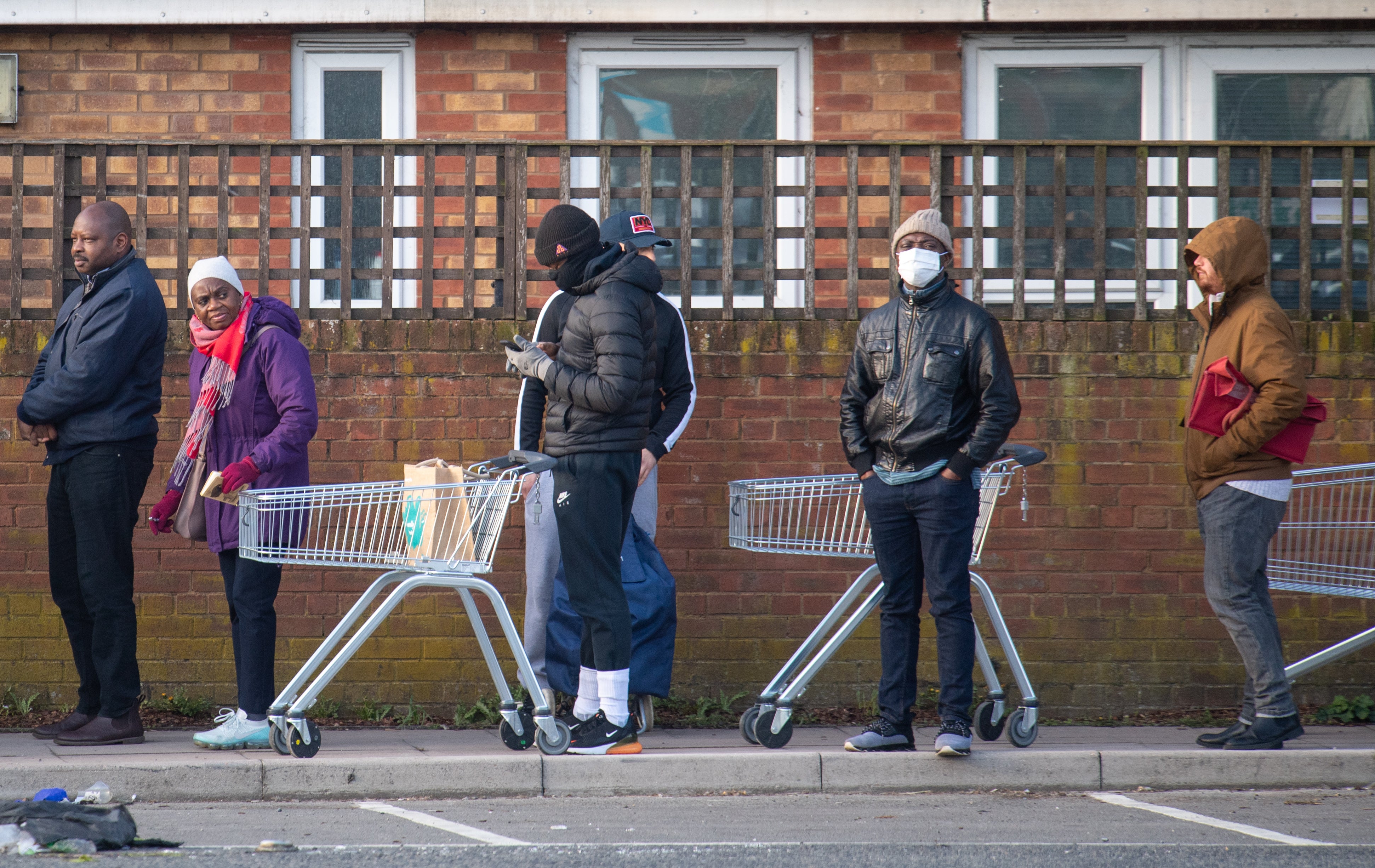 Lidl enjoyed a boost in sales as customers queued up during the pandemic to do their shopping (Dominic Lipinski / PA)