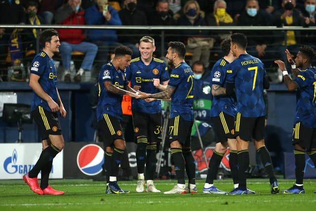Jadon Sancho, second left, celebrates scoring his first Manchester United goal (Isabel Infantes/PA)