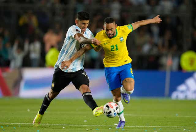 <p>Cristian Romero (left) picked up the injury playing for Argentina against Brazil (Natacha Pisarenko/AP).</p>