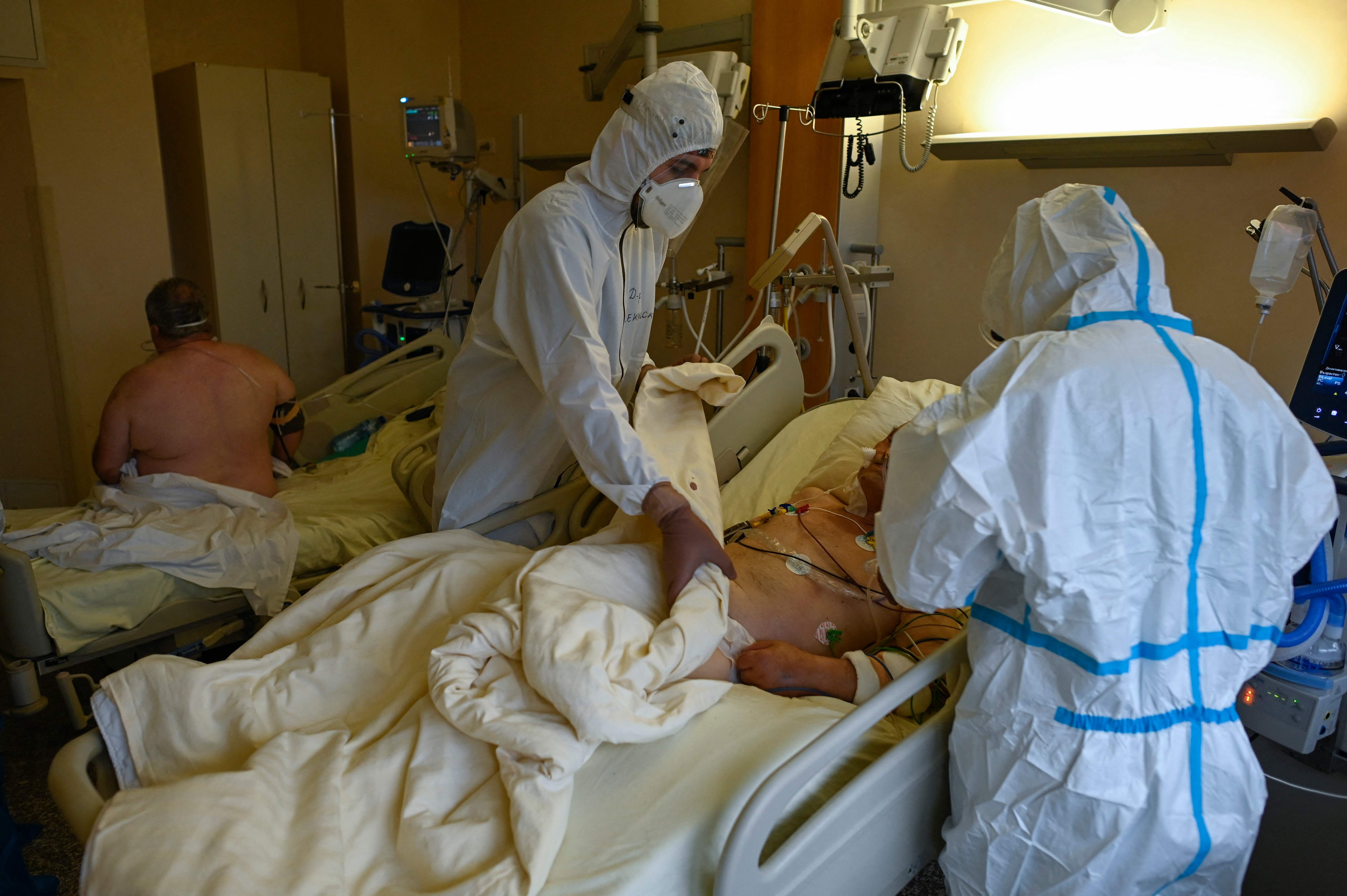 Doctors in Sofia attend to a Covid-19 patient in intensive care
