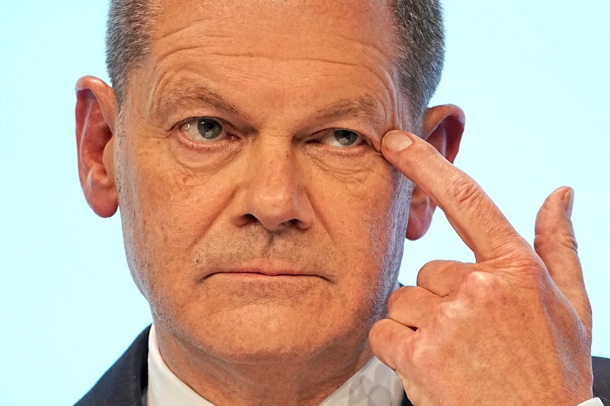 Scholz seals deal to crown career as German chancellor | The Independent