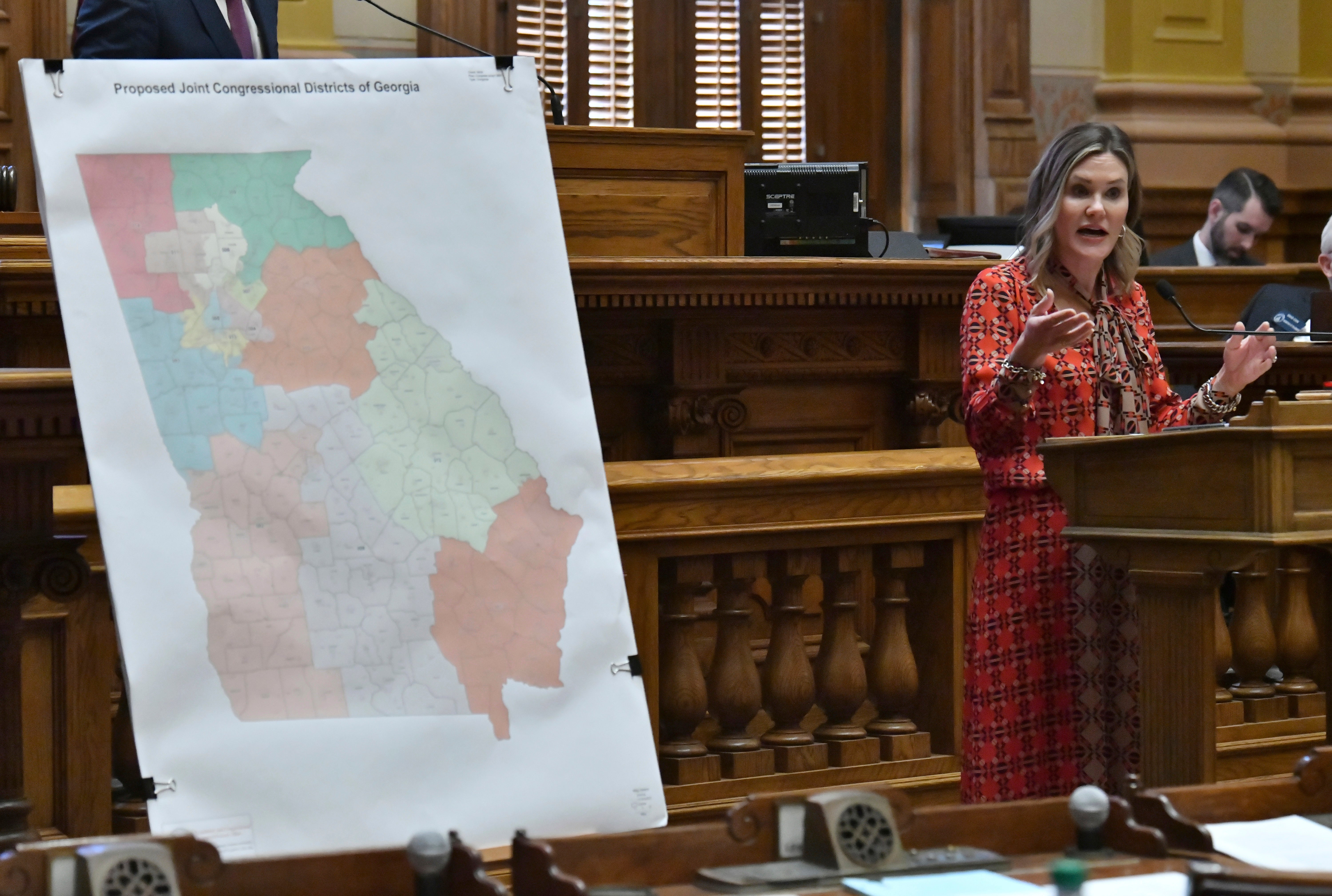Georgia state Senator Elena Parent speaks in opposition to the state’s newly drawn congressional maps that Republicans helped move to Governor Brian Kemp’s desk for approval.