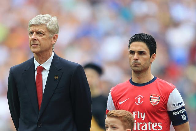 <p>Current Arsenal manager Mikel Arteta (right) is keen to link up with former boss Arsene Wenger once again</p>