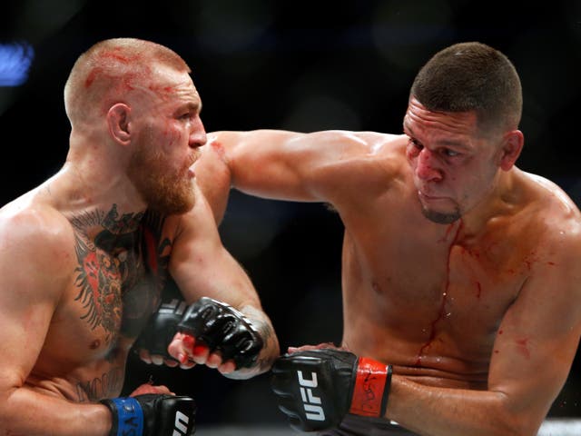 <p>Conor McGregor (left) and Nate Diaz during their second meeting</p>