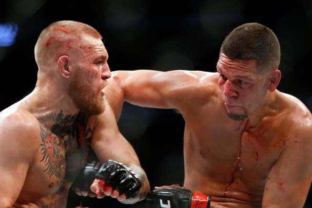 <p>Conor McGregor (left) and Nate Diaz during their second meeting</p>