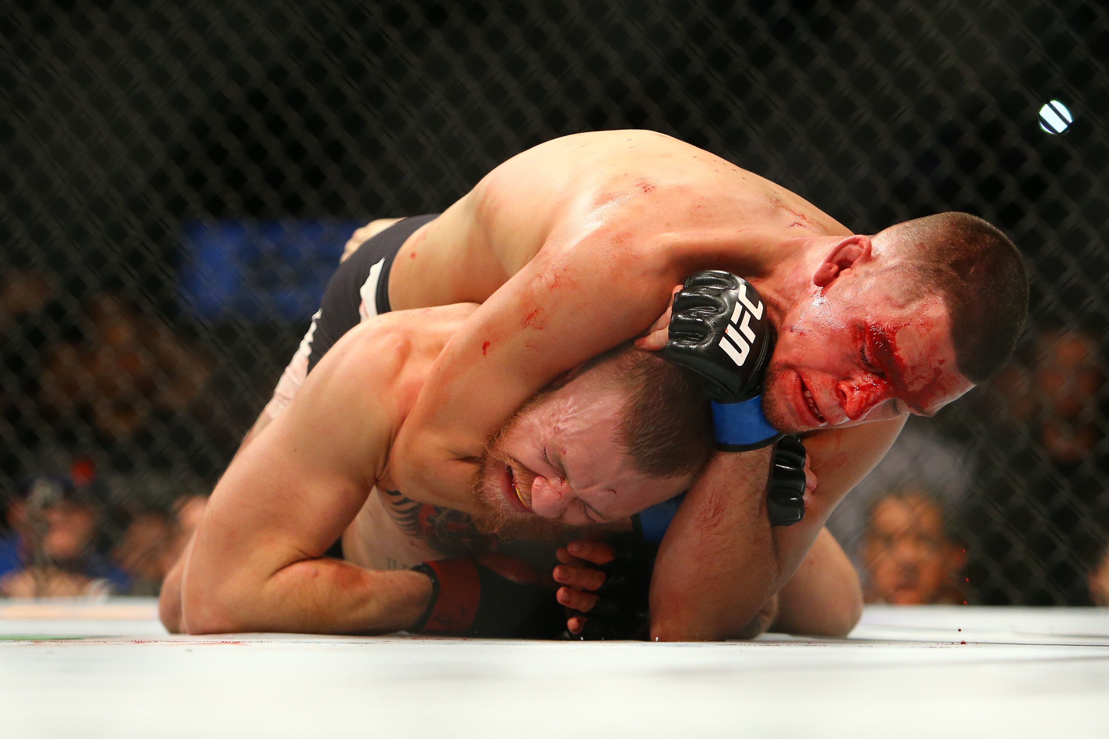 Nate Diaz (top) submitted Conor McGregor in their first of two UFC clashes