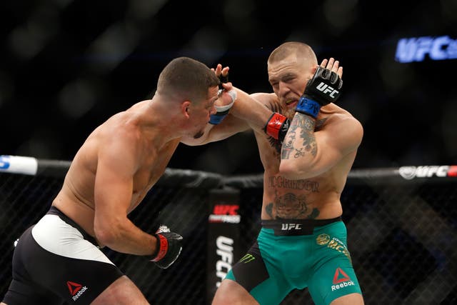 <p>Nate Diaz and Conor McGregor during their second fight </p>