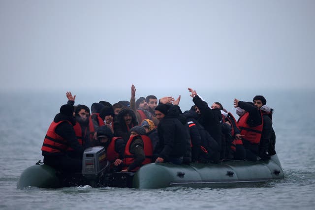 <p>A dinghy heads out from the French coast to cross the English Channel </p>