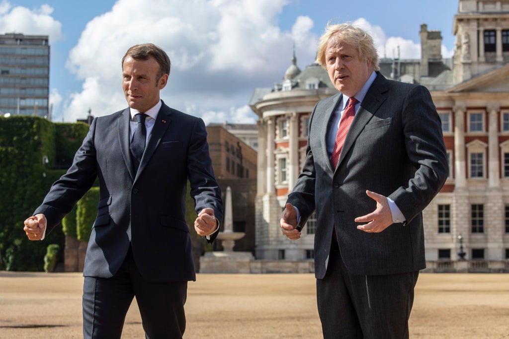 Boris Johnson congratulates Macron on re-election to French presidency after polls predict Le Pen defeat