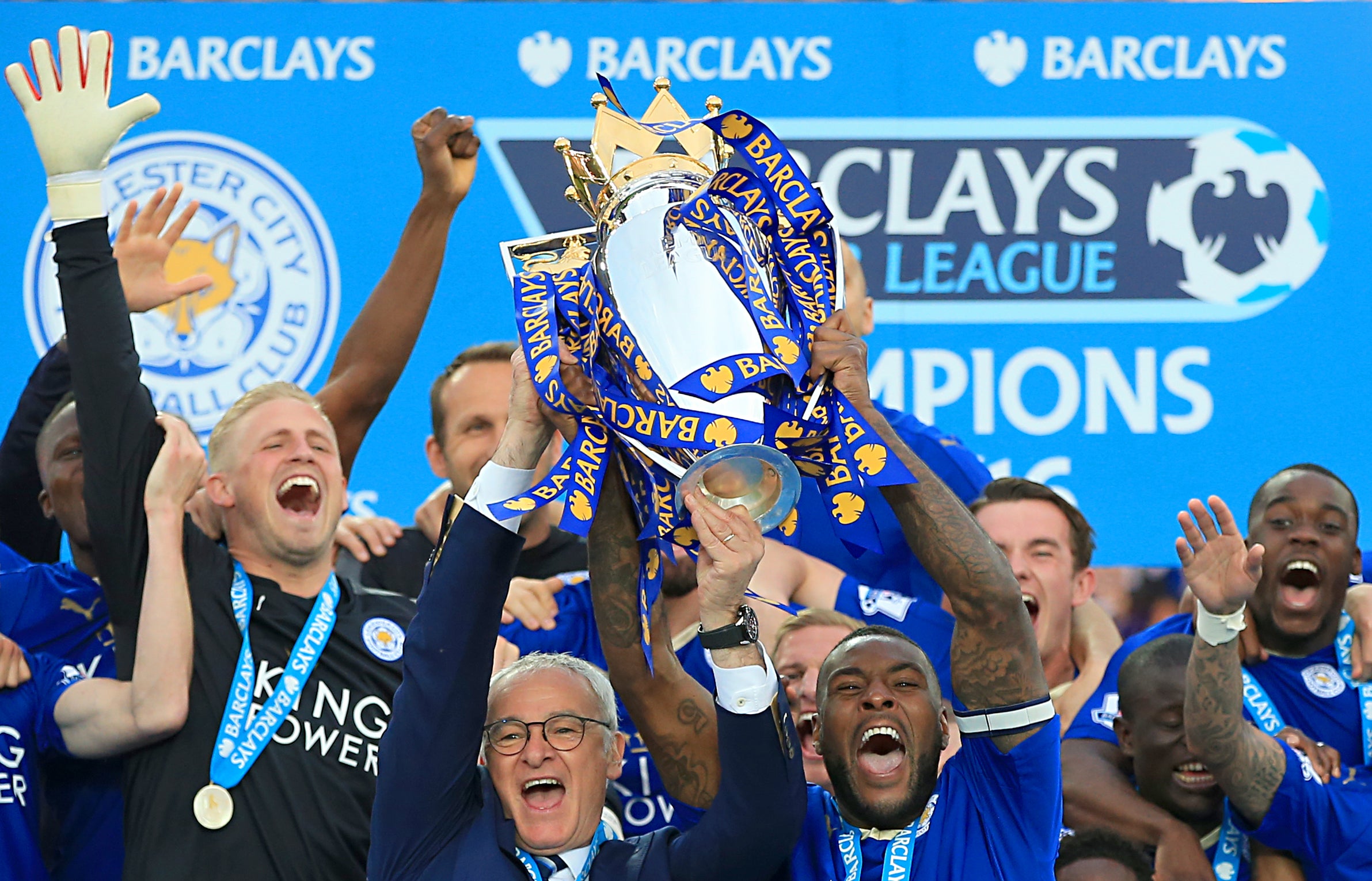 Leicester captain Wes Morgan and manager Claudio Ranieri lift the 2016 Premier League trophy (Nick Potts/PA)