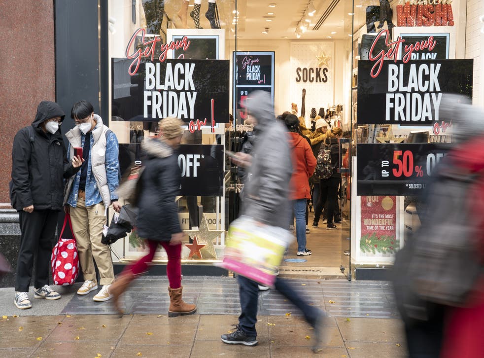 <p>Shoppers on Oxford Street in London, on Black Friday (Dominic Lipinski/PA)</p>