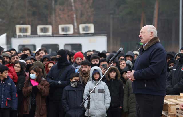 <p>Belarusian President Alexander Lukashenko speaks to migrants at the country’s border with Poland</p>