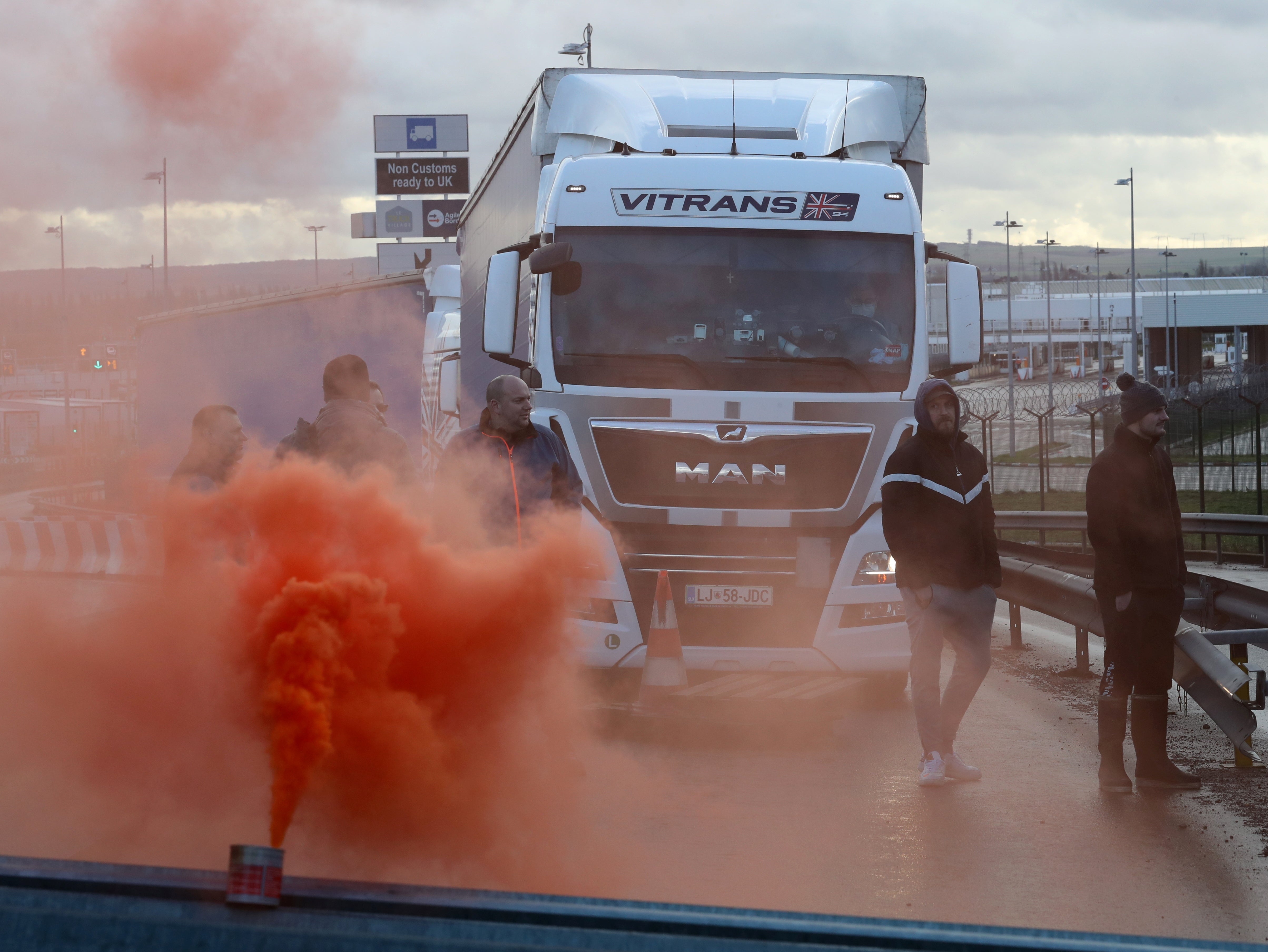 <p>French fishermen block trucks at the Eurotunnel Freight Terminal </p>