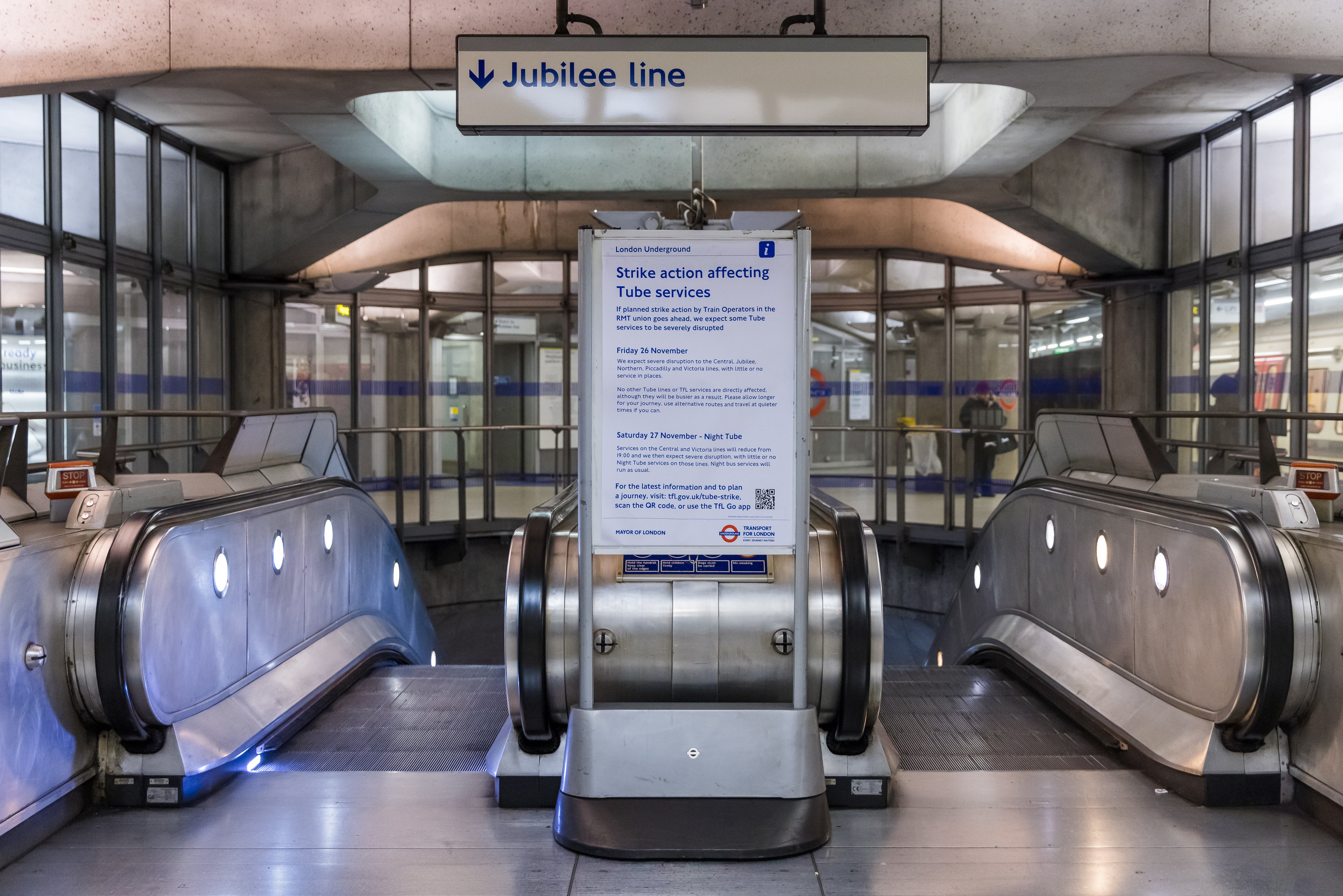 Signs inform passengers about the strike action affecting tube services at Westminster underground station