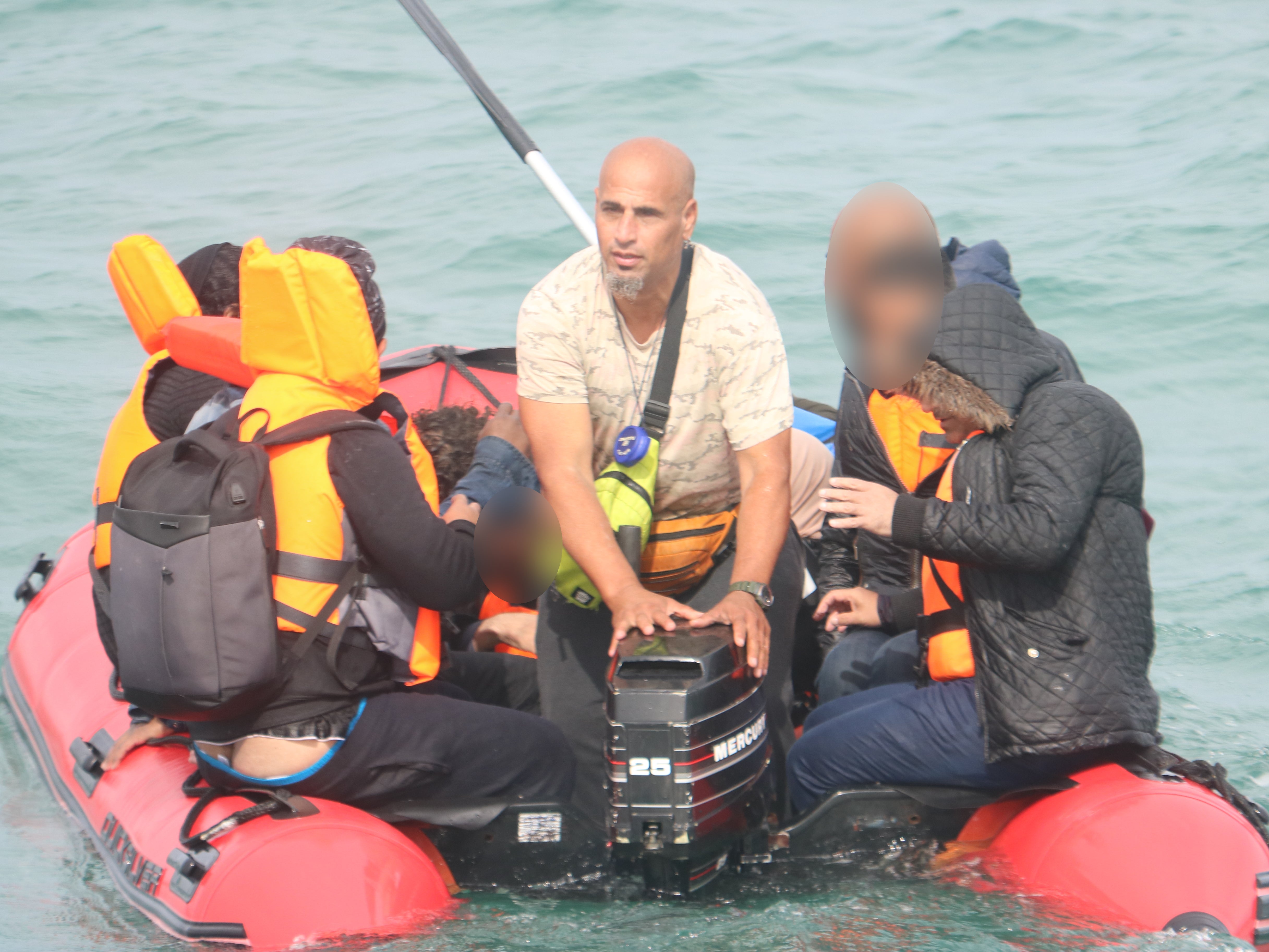 Fariboz Rakei steering a dinghy on his second Channel crossing