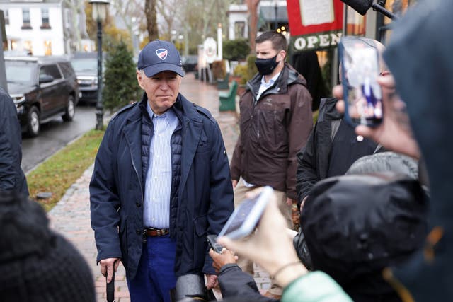 <p>President Joe Biden speaks to the media before entering "Nantucket Bookworks" bookstore following lunch with family at the Nantucket Tap Room, in Nantucket island, Massachusetts, U.S, November 26, 2021</p>