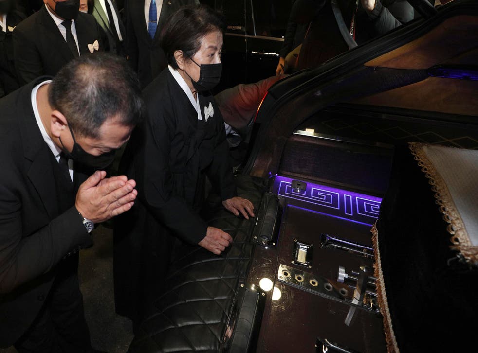 <p>Lee Soon-ja, second from right, the wife of the late former South Korean President Chun Doo-hwan, watches the coffin containing the body of her husband at a funeral hall in Seoul, South Korea on 27 November 2021 </p>