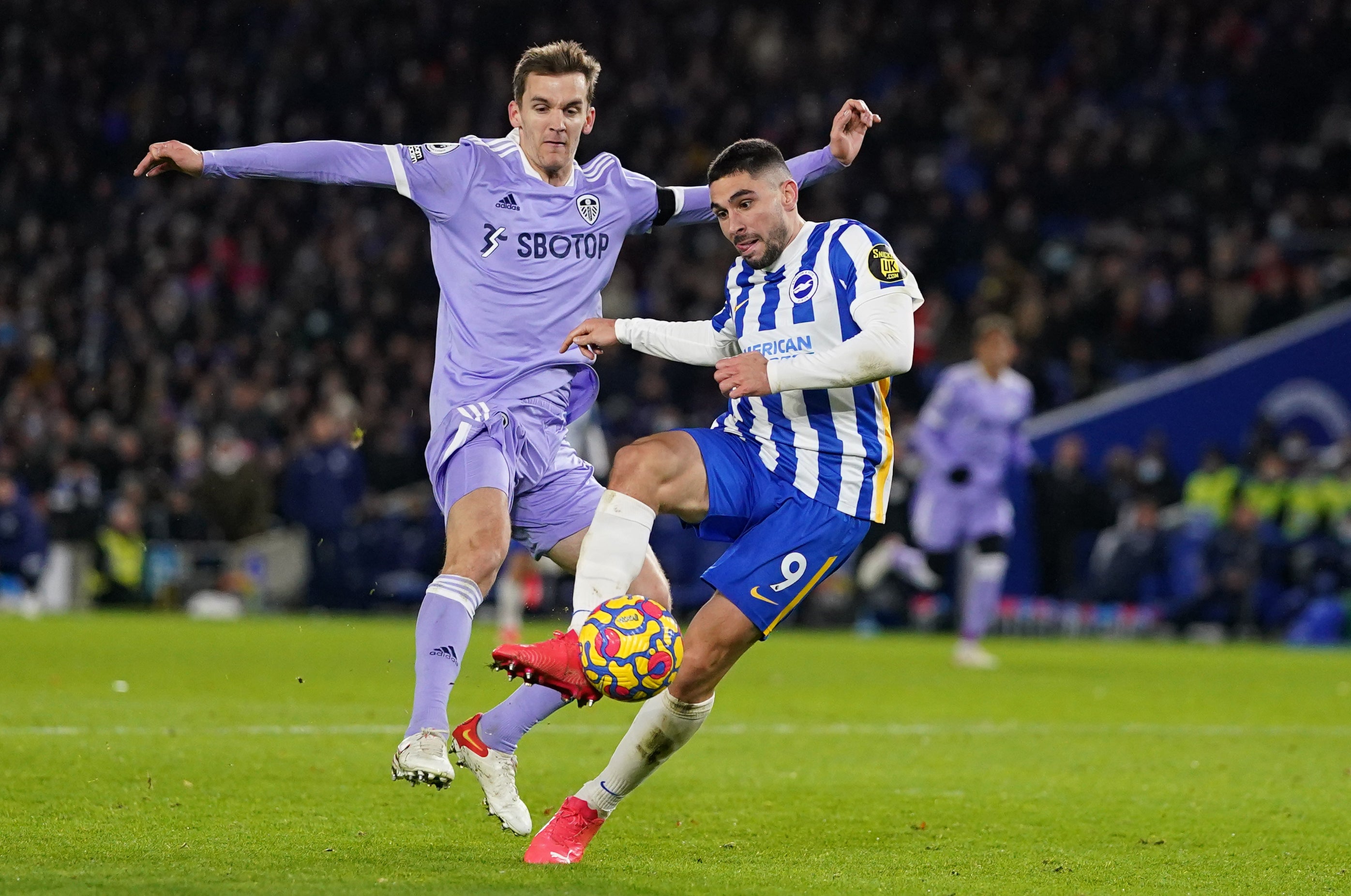 Brighton’s Neal Maupay (right) in action against Leeds