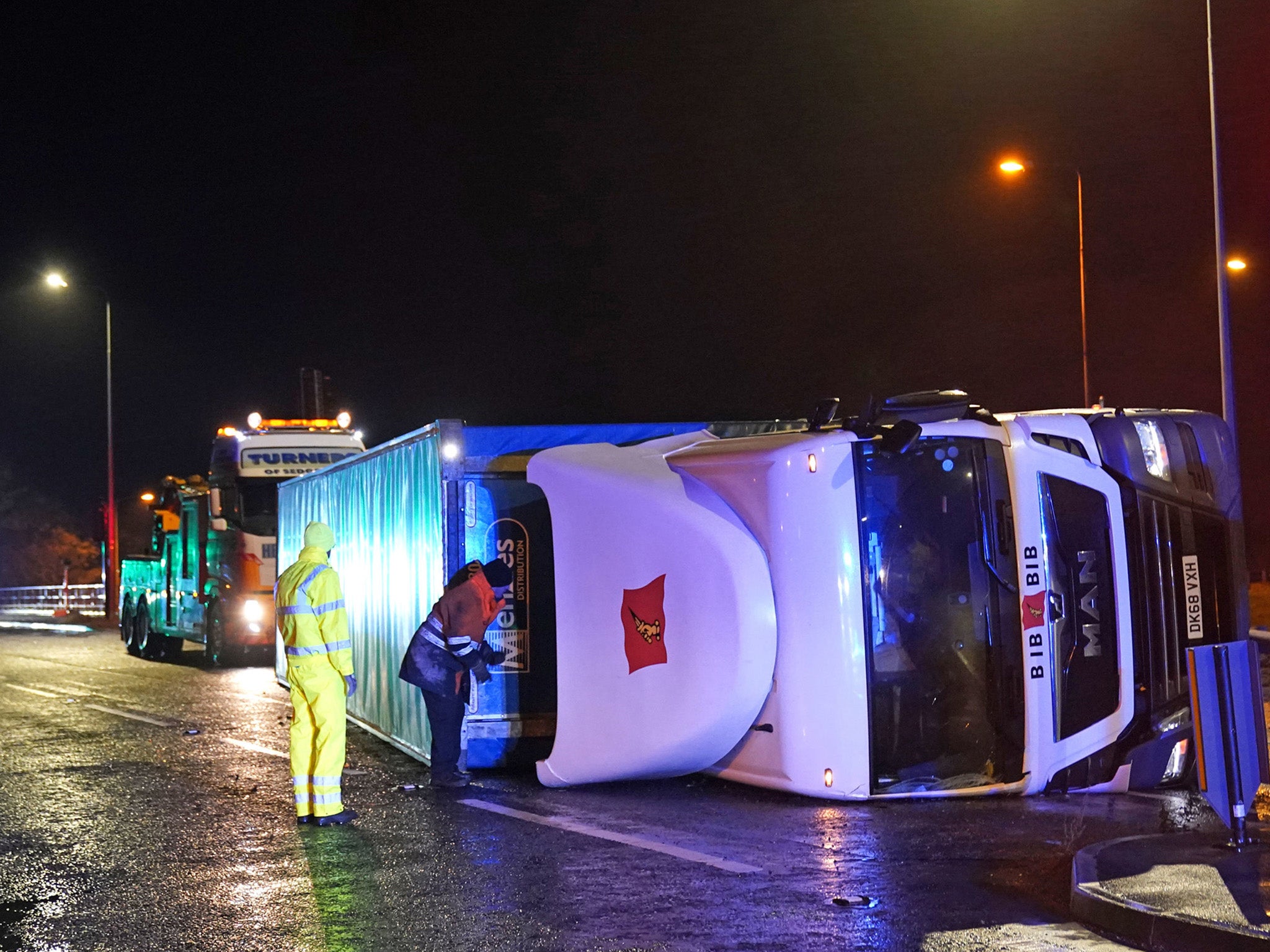 A lorry blown over in high winds blocks the A179 near Hartlepool, as gusts reached nearly 100mph in the northeast