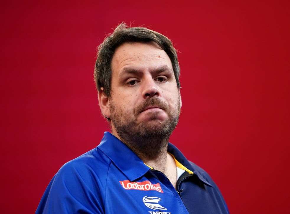Adrian Lewis (pictured) was beaten 6-5 by Peter Wright on Saturday (Zac Goodwin/PA).