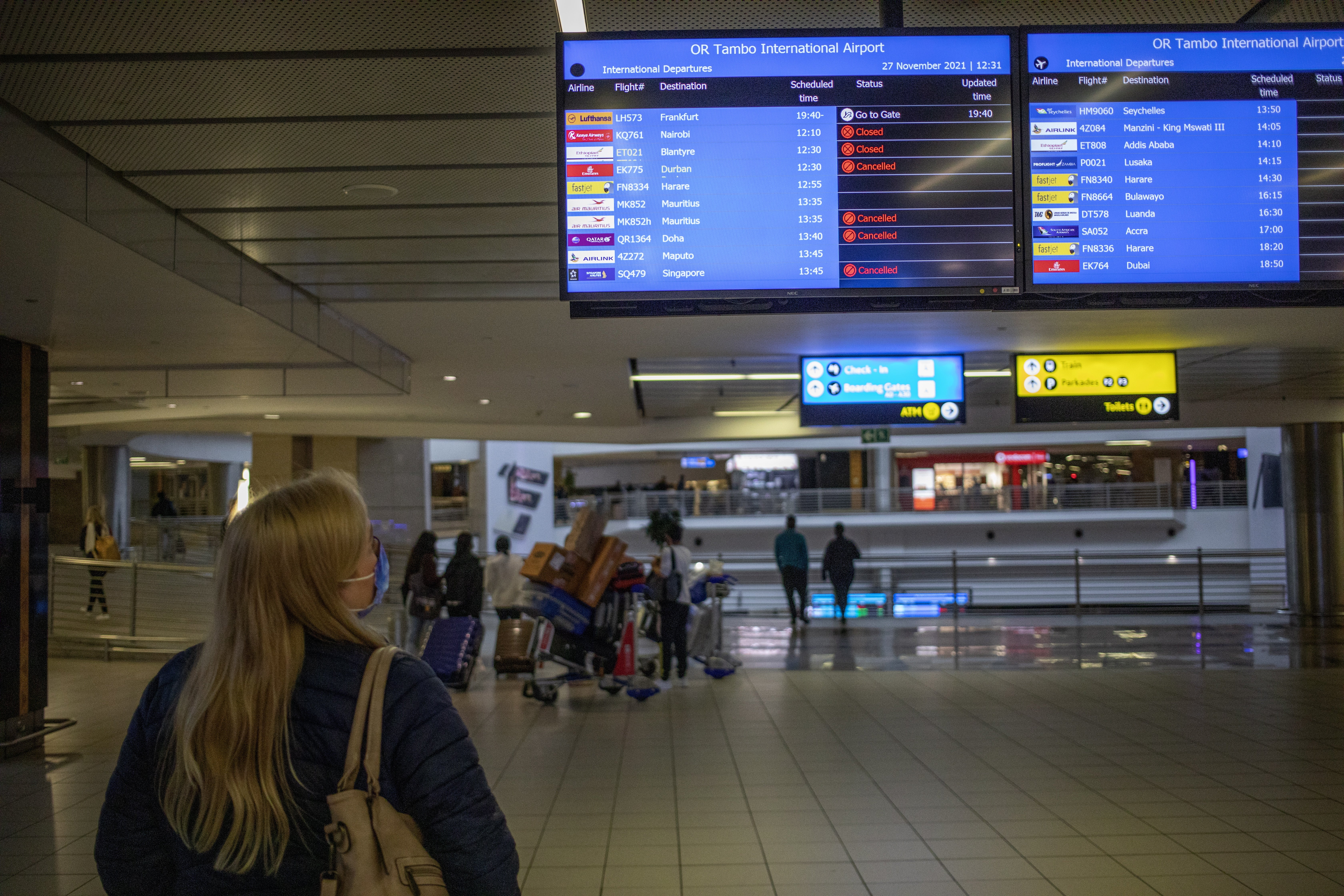 An information board shows canceled flights at OR Thambo International Airport in Johannesburg