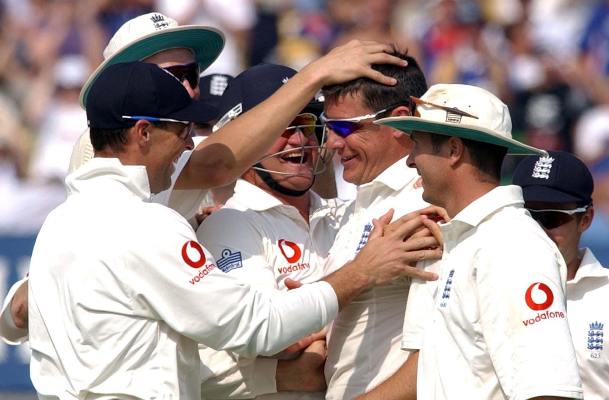 Giles, second right, and Michael Vaughan, right, were England teammates