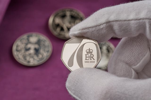 <p>Photo issued by the Royal Mint of a a new fifty pence coin created to celebrate the Queen’s Platinum Jubilee that will be launched next year</p>