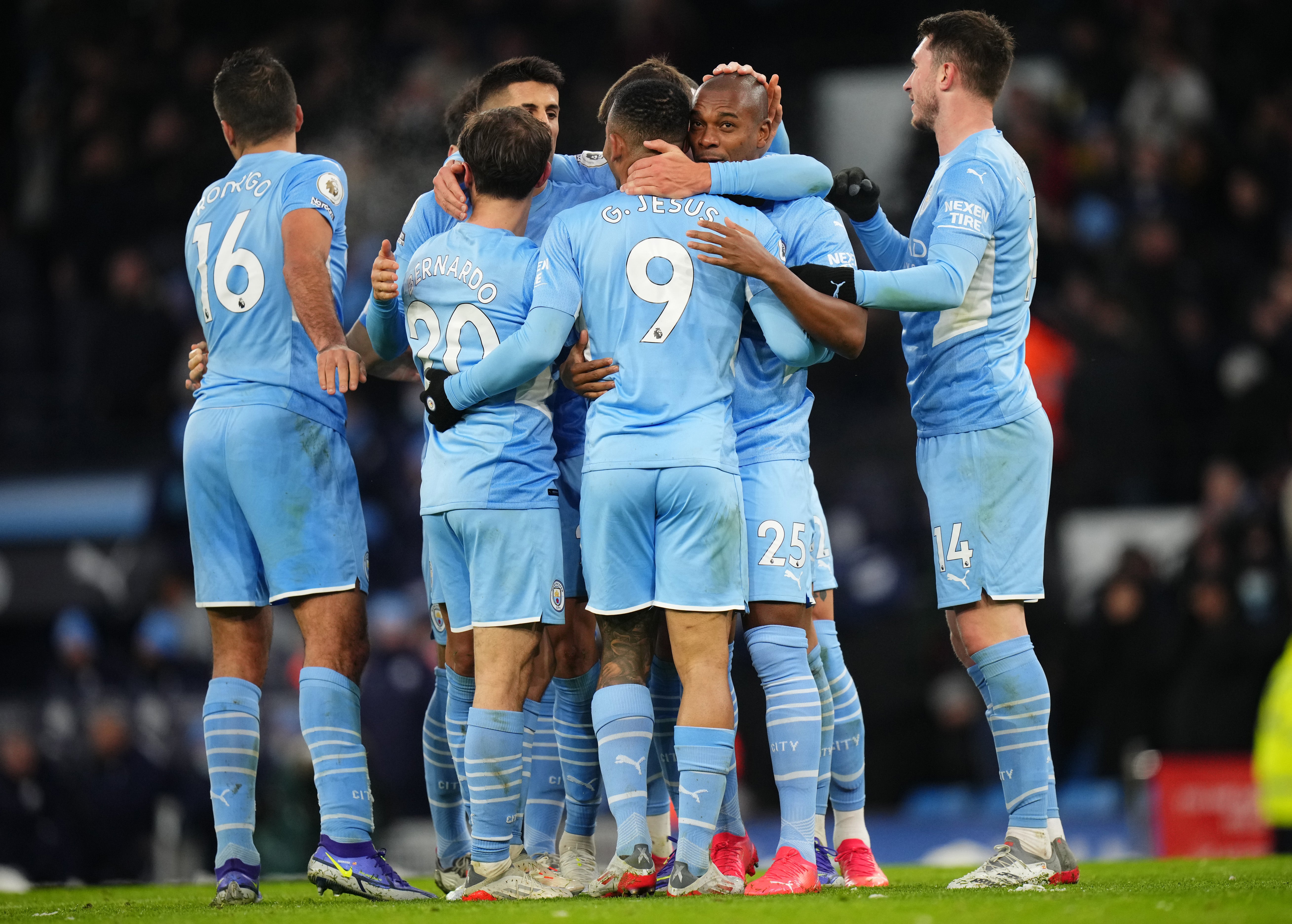 Manchester City players celebrate during their win against West Ham