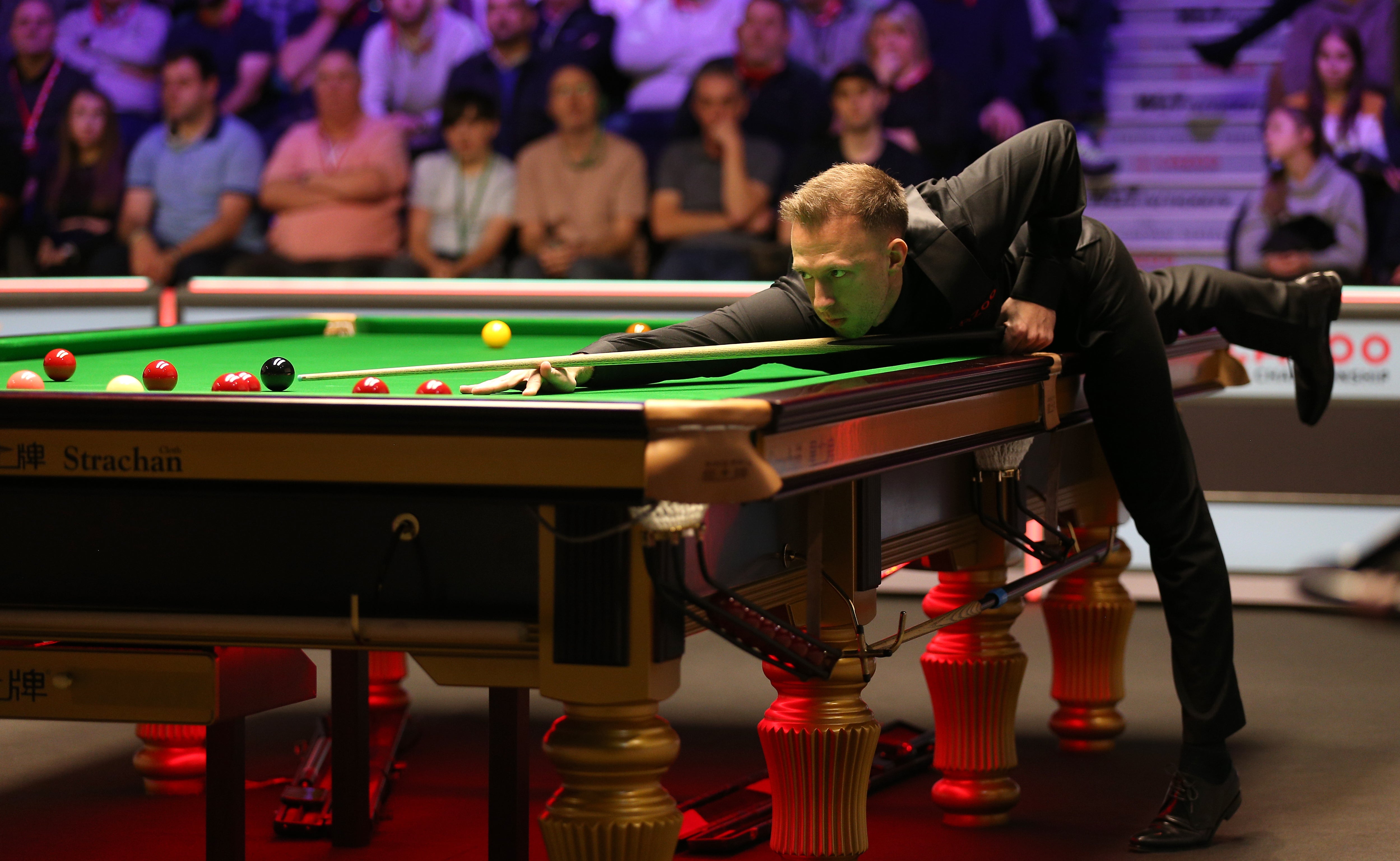Judd Trump secured his spot in the third round (Nigel French/PA)