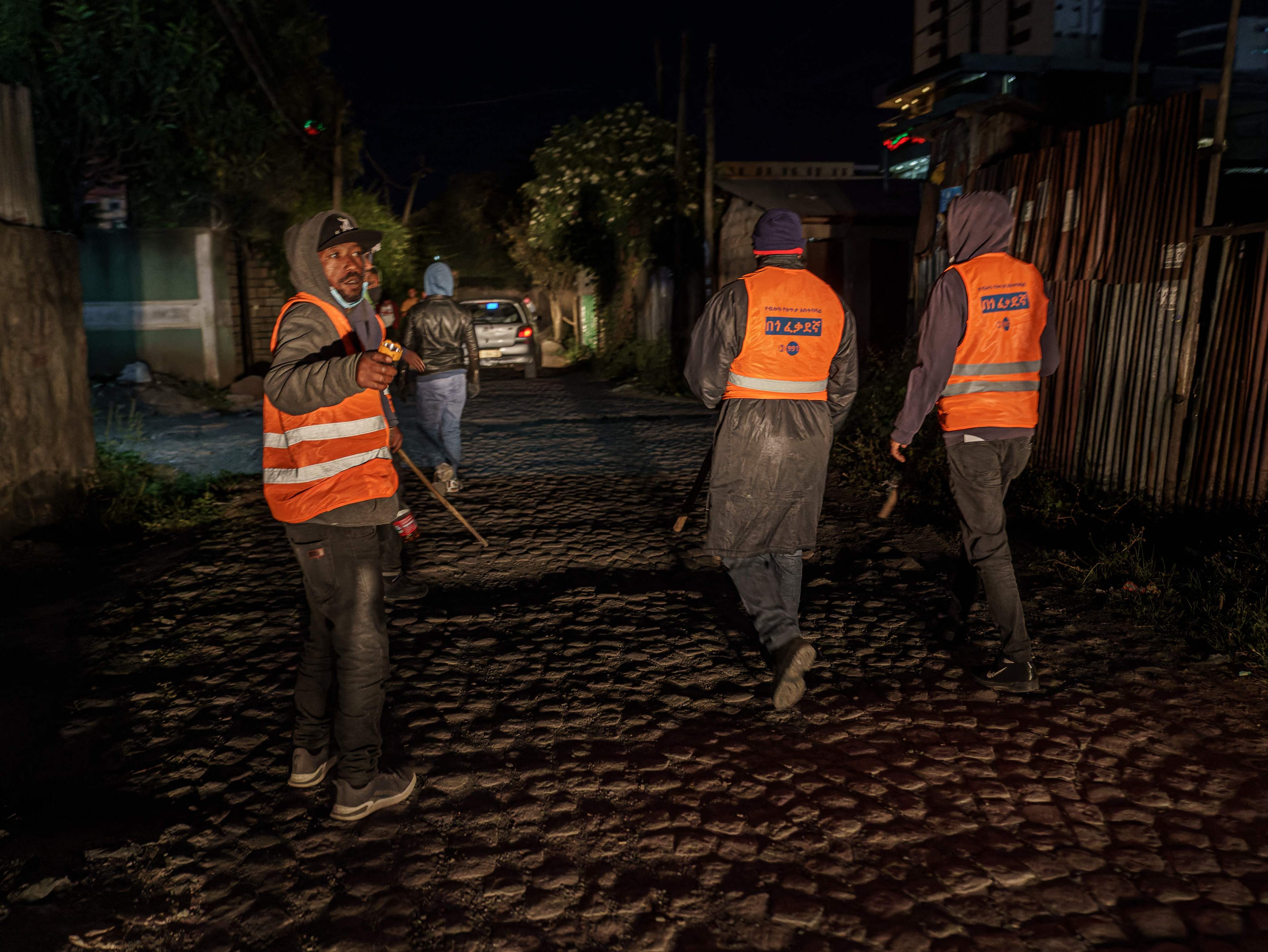 Volunteers conduct a night patrol in Addis Ababa