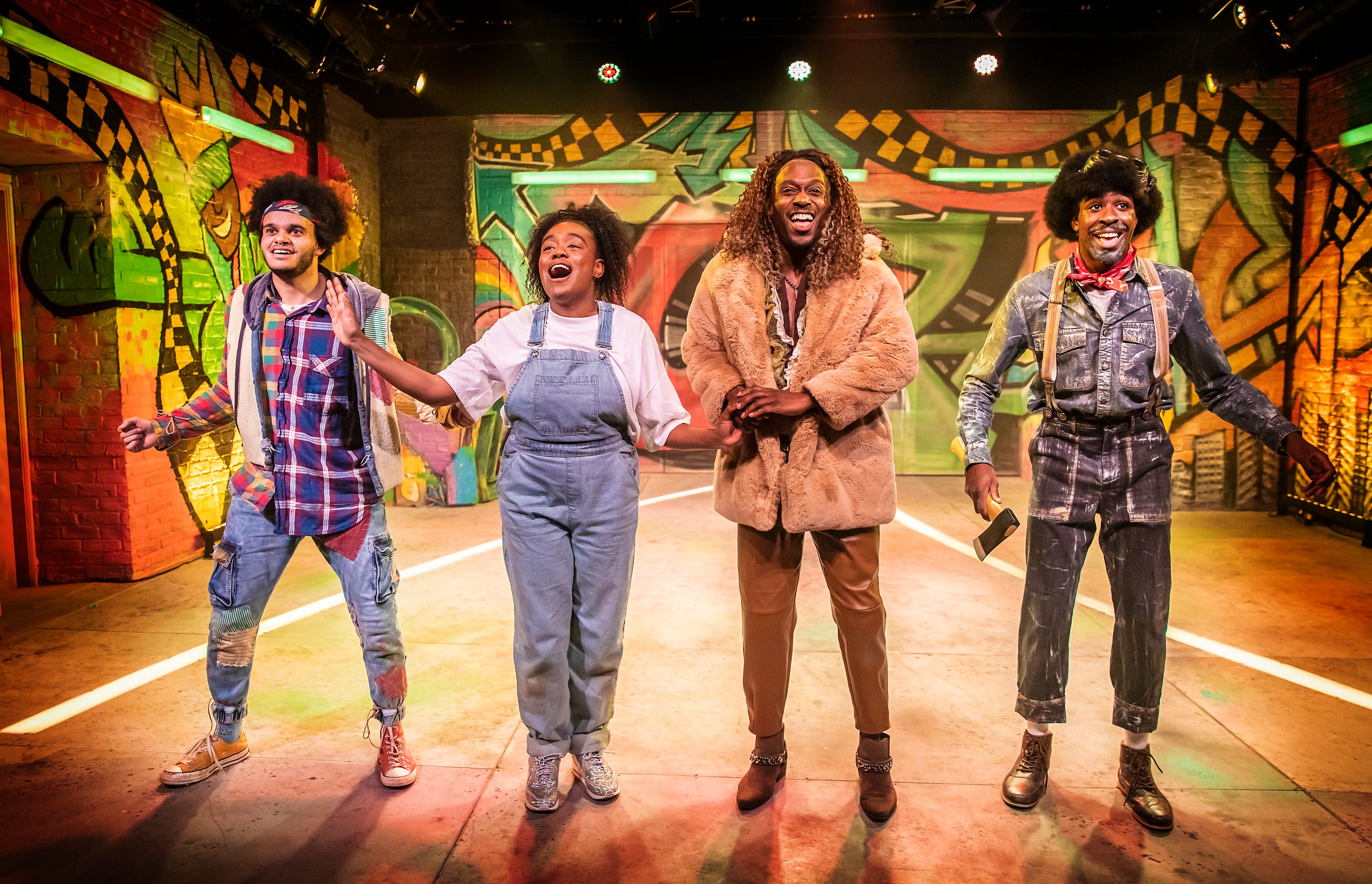 Tarik Fimpong (Scarecrow), Cherelle Williams (Dorothy), Jonathan Andre (Lion), Llewellyn Graham (Tinman) in ‘The Wiz' at Hope Mill Theatre
