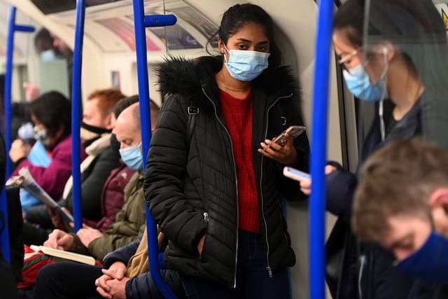 <p>Mask wearing will once again be mandatory on public transport and in shops in England </p>