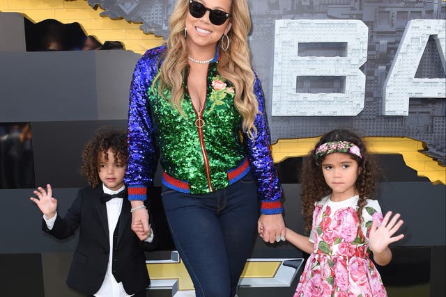 <p>Mariah Carey with her children Morrocan (L) and Monroe (R)</p>