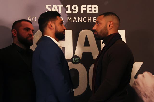 <p>Amir Khan and Kell Brook go head-to-head at the press conference</p>