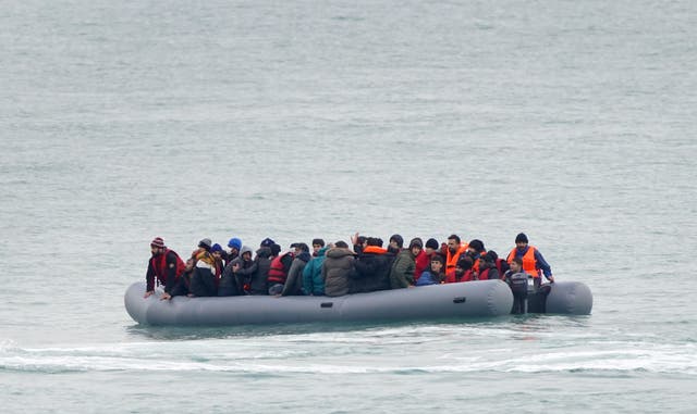 <p>A group of people thought to be migrants adrift in a dinghy in the Channel</p>