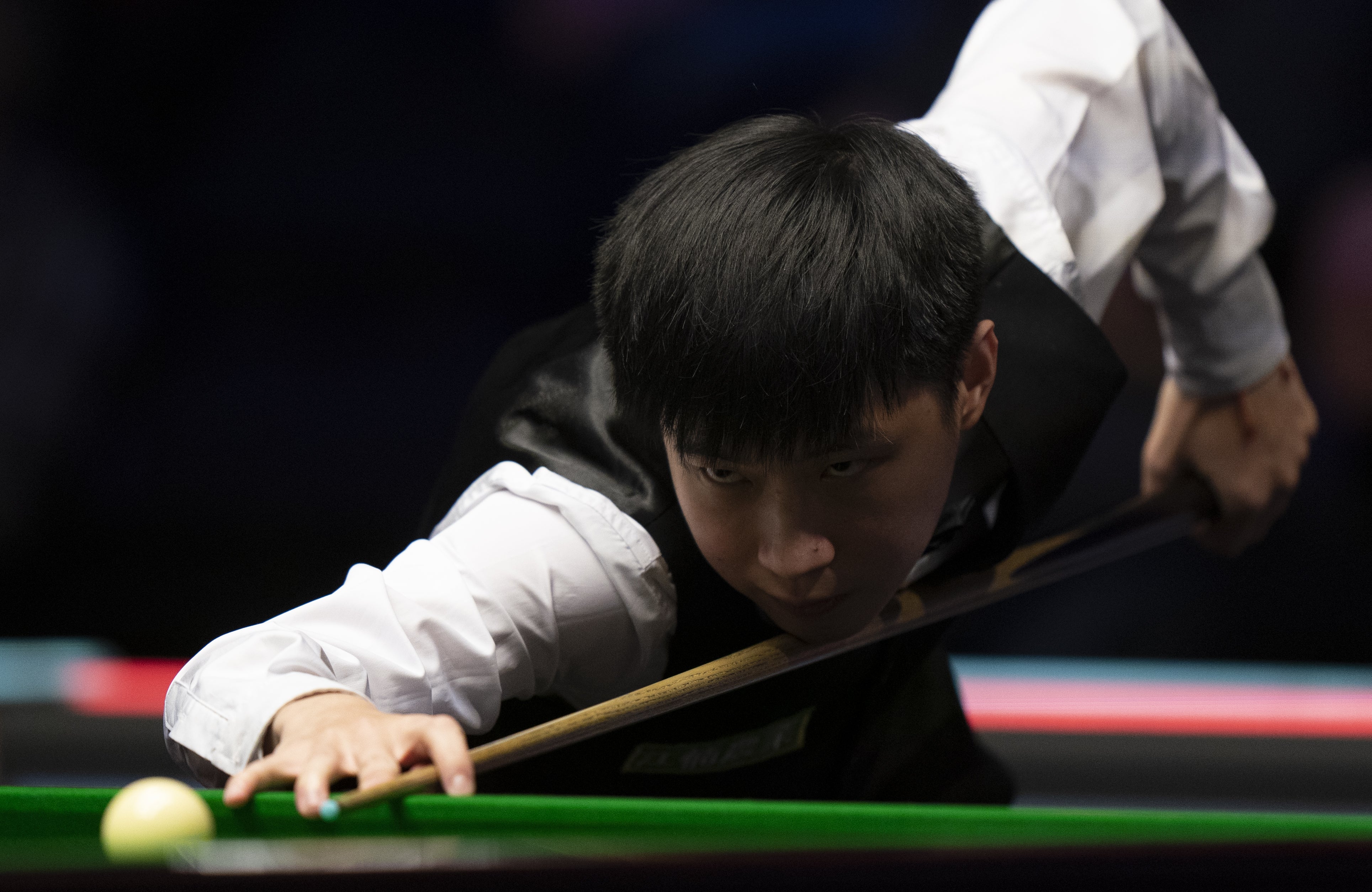 Zhao Xintong is through to the last 16 (Tim Goode/PA)