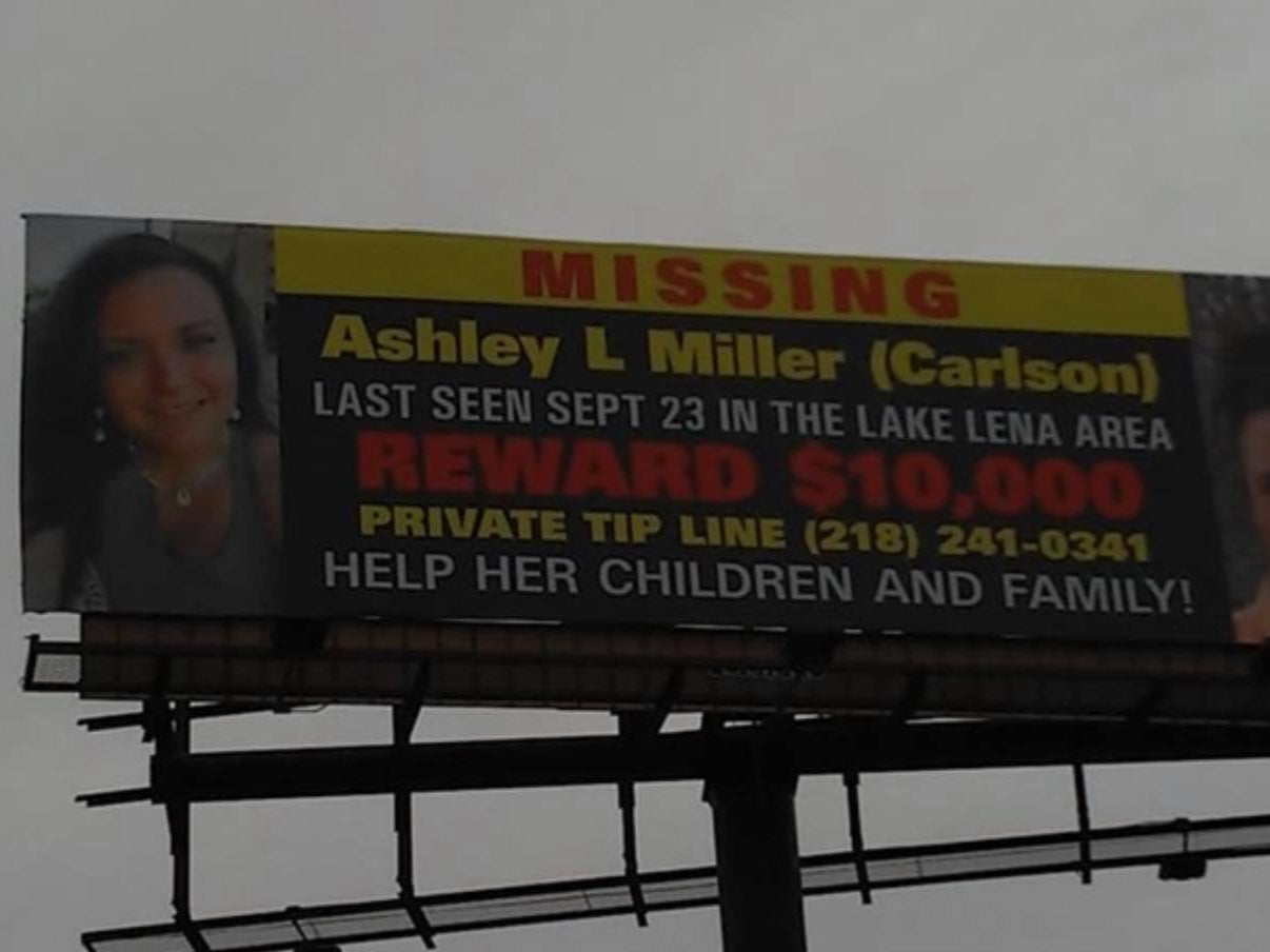 A billboard for the missing woman posted by her family