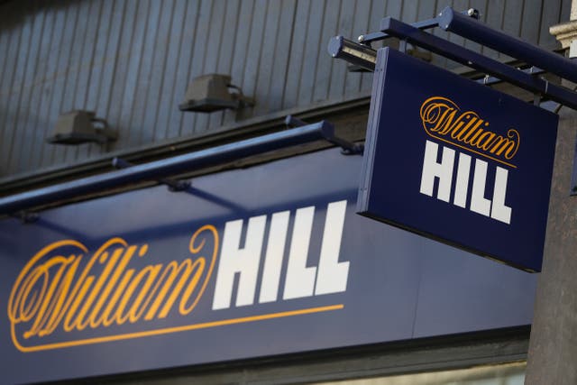 888 has sealed a deal to buy William Hill’s European business, including its UK betting shops (Aaron Chown/PA)