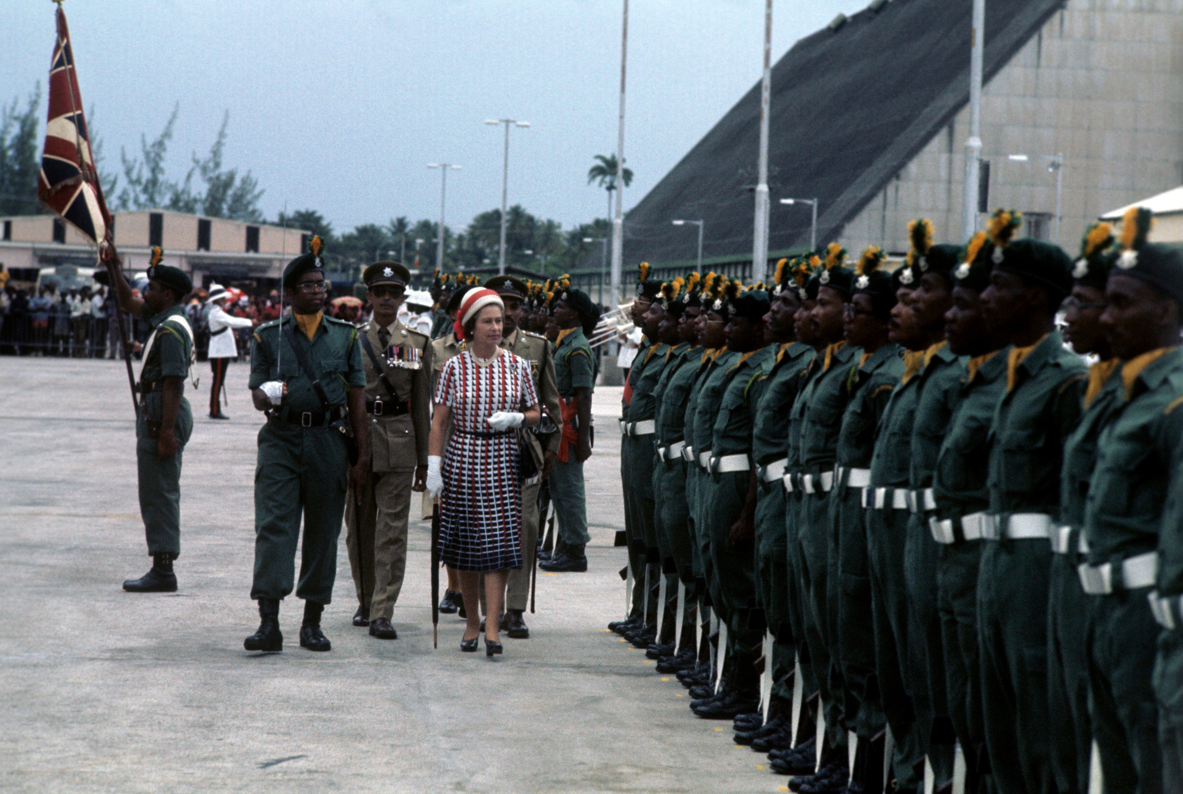 Queen Elizabeth II inspecting a guard of honour mounted by the Barbados Regiment on her arrival in Bridgetown in 1977