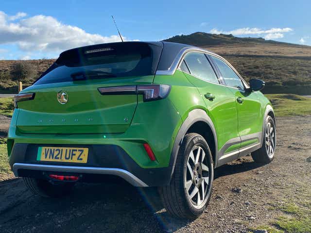 <p>The new all-electric Vauxhall Mokka-e shines amid Dartmoor’s dramatic landscape.   </p>