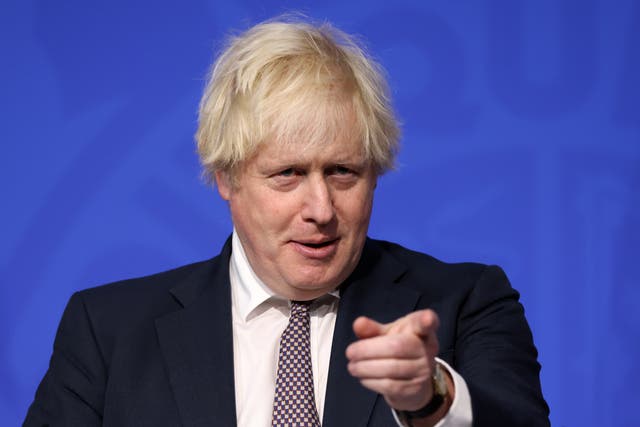 Prime Minister Boris Johnson said the military would help the NHS deliver booster jabs (Hollie Adams/PA)