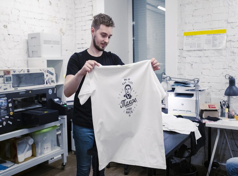 <p>Kirill Karavaev in his T-shirt shop in Moscow with one bearing the message: “How About This Elon Musk?”</p>