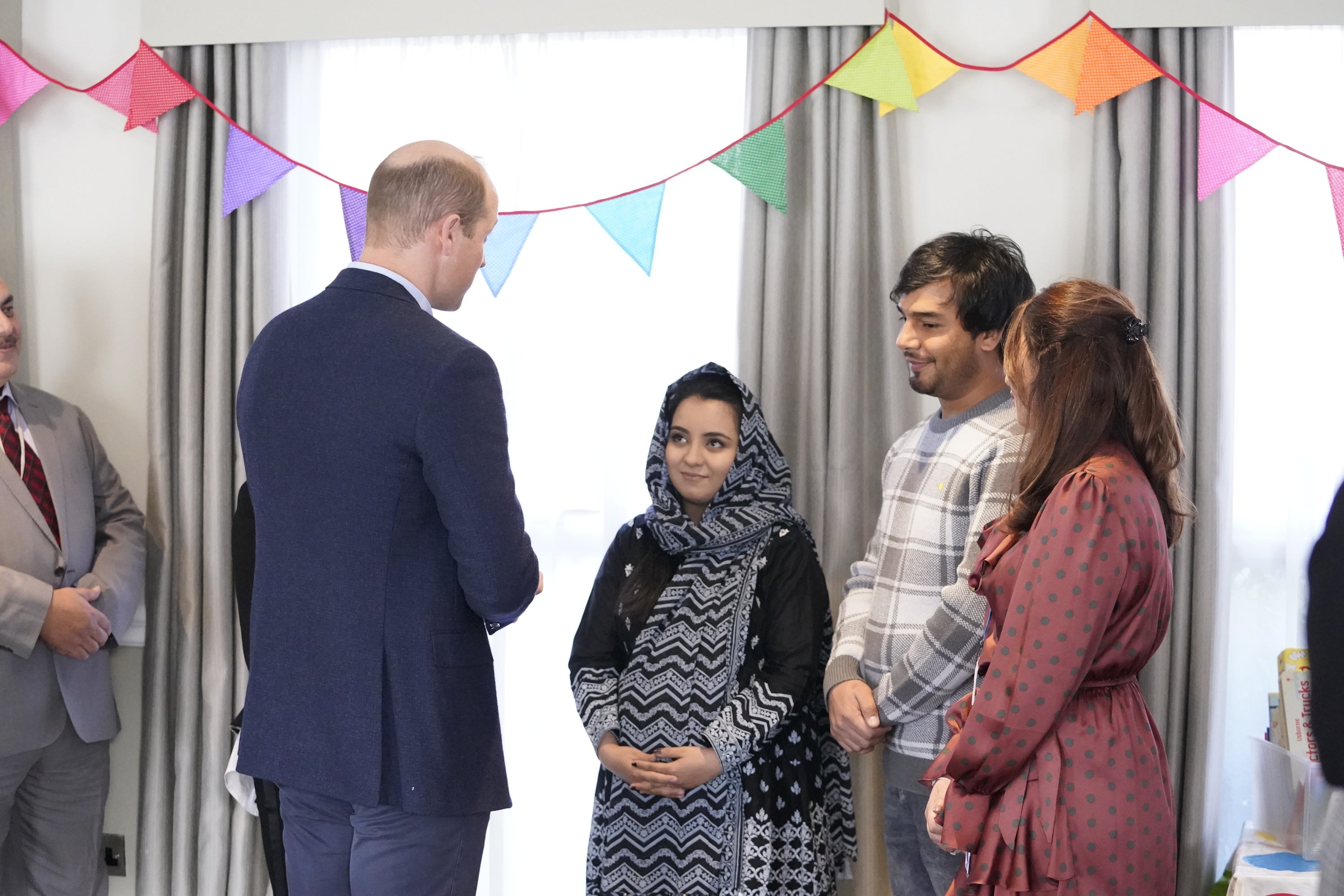 The Duke of Cambridge speaks to refugees (Danny Lawson/PA)