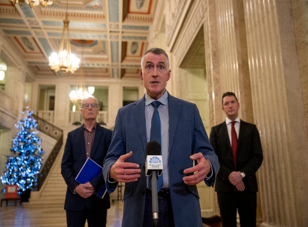 Sinn Fein National chairperson Declan Kearney MLA (centre) with party colleagues Gerry Kelly MLA (left) and John Finucane MLA (right) gives reaction after an meeting with Secretary of State for Northern Ireland Brandon Lewis on Troubles legacy during a press conference in the Great Hall of Parliament Buildings at Stormont (Liam McBurney/PA)
